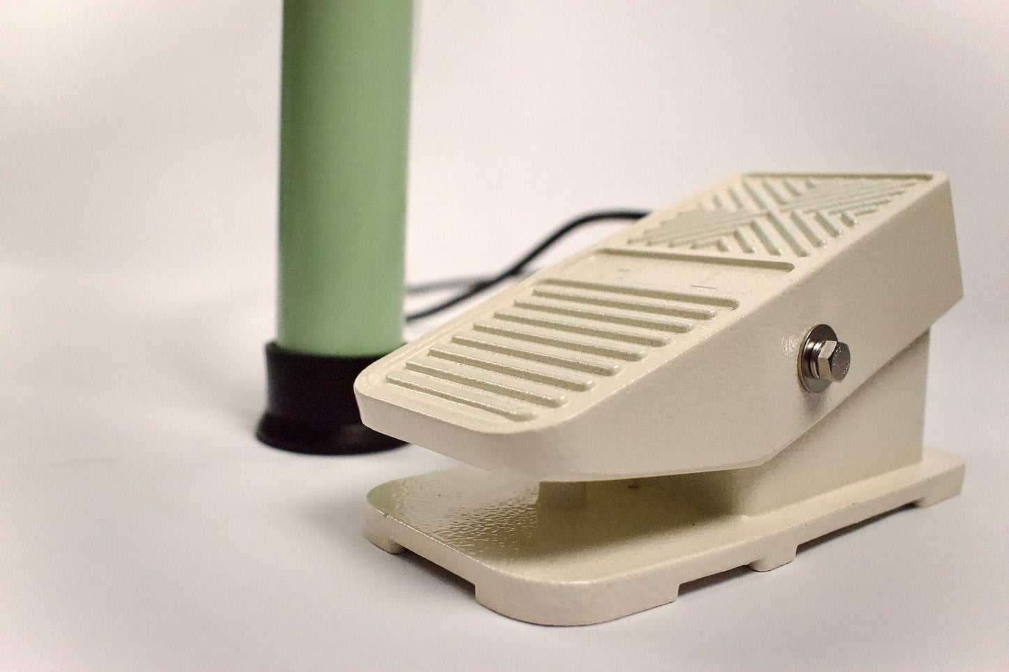 close up of pottery wheel foot pedal